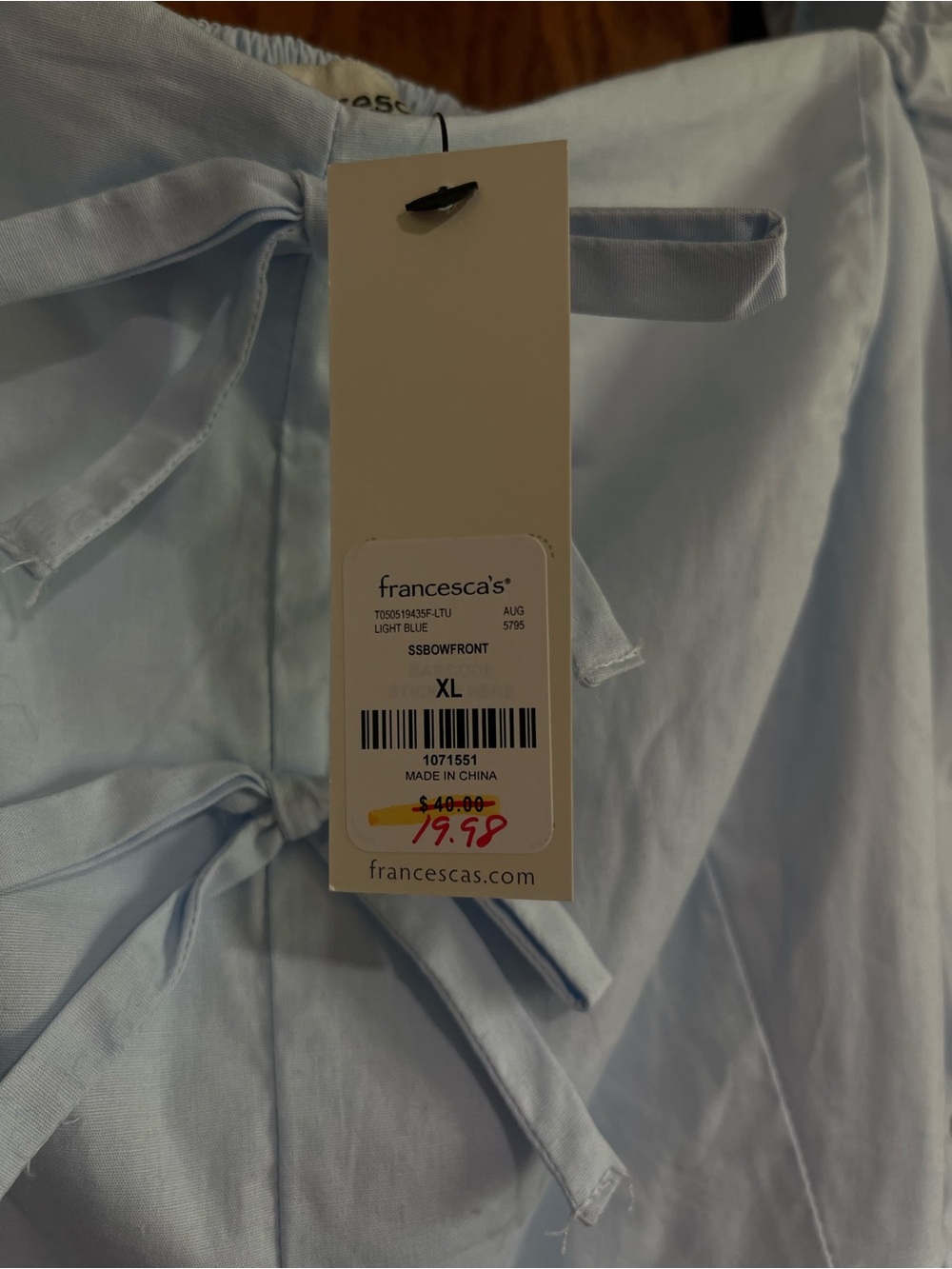 Francesca's Collections Light Blue Puff Sleeve Peplum Blouse with Front Bows - Picture 3 of 3